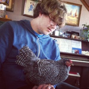 A boy and his chicken